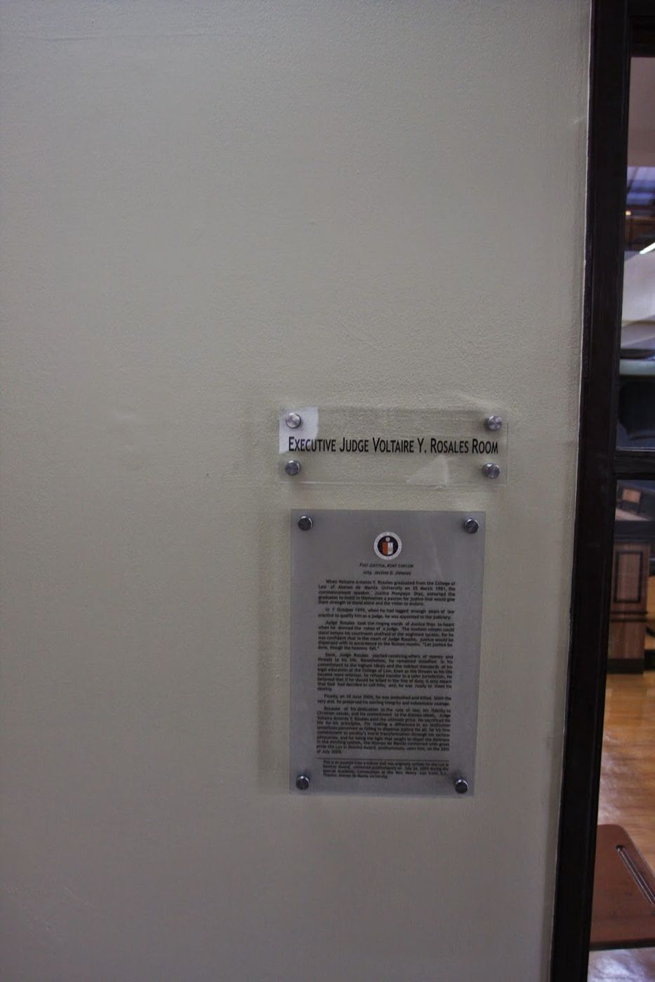 The name plate and tribute plaque at the door of the Rosales Room